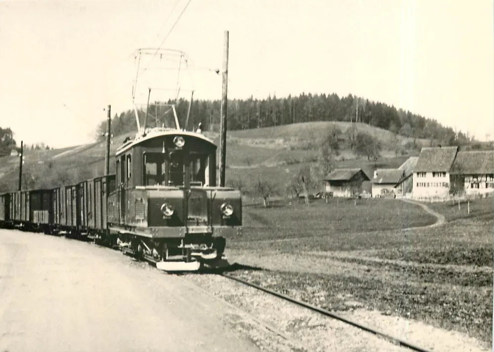 Güterzug Nr. 809 — pierwsze wykorzystanie lokomotywy Ge 4/4 7 — E.B. Leutweller, Postillier, FW 16 - Awers