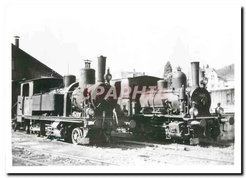 रिजर्व लोकोमोटिव UeBB Ed 3/4 41 (क्रॉउस म्यूनिख 1909) और E 3/3 402 (SLM 1900) — हिनविल के डिपो के सामने — एर्नस्ट बी. लूटविलर वर्लग - आगे
