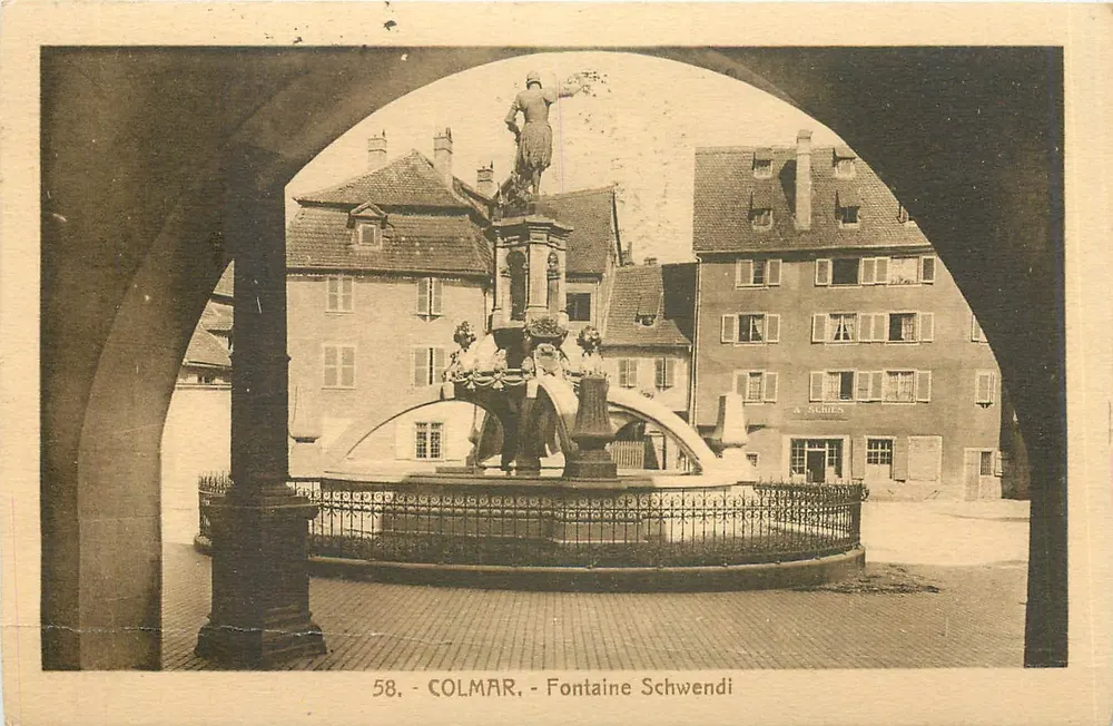 Colmar - Fontaine Schwendi — vista sob um arco, editor A. Schries, n° 58 - Frente