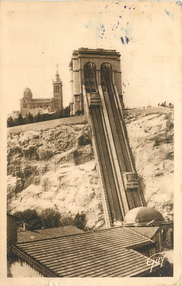 Marseille (B.-du-R.) — Les Ascenseurs et Basilique de Notre-Dame de la Garde — Éditeur André Guy, n° H. 204 - Recto