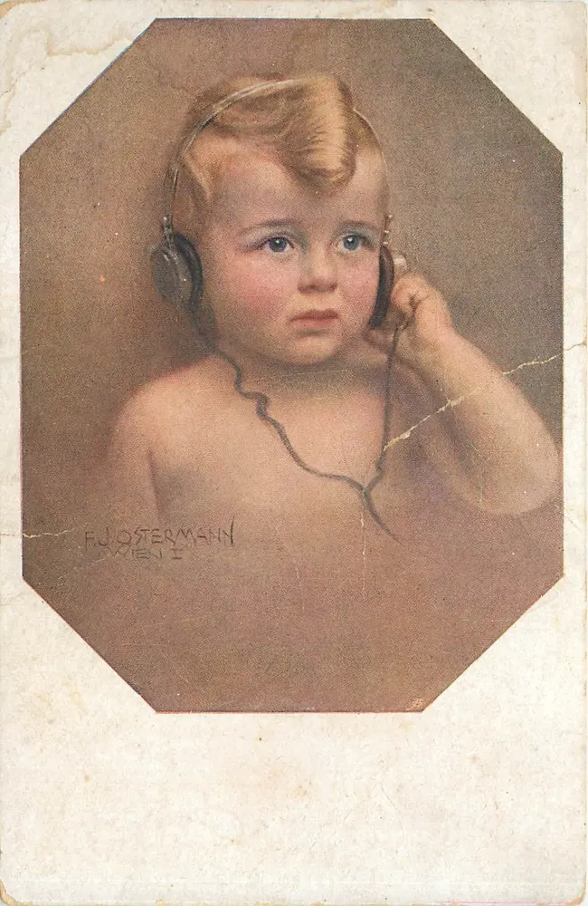 Criança com capacete telefônico — ilustração de F.J. OSTERMANN — editada por Raphael Tuck & Fils - Frente