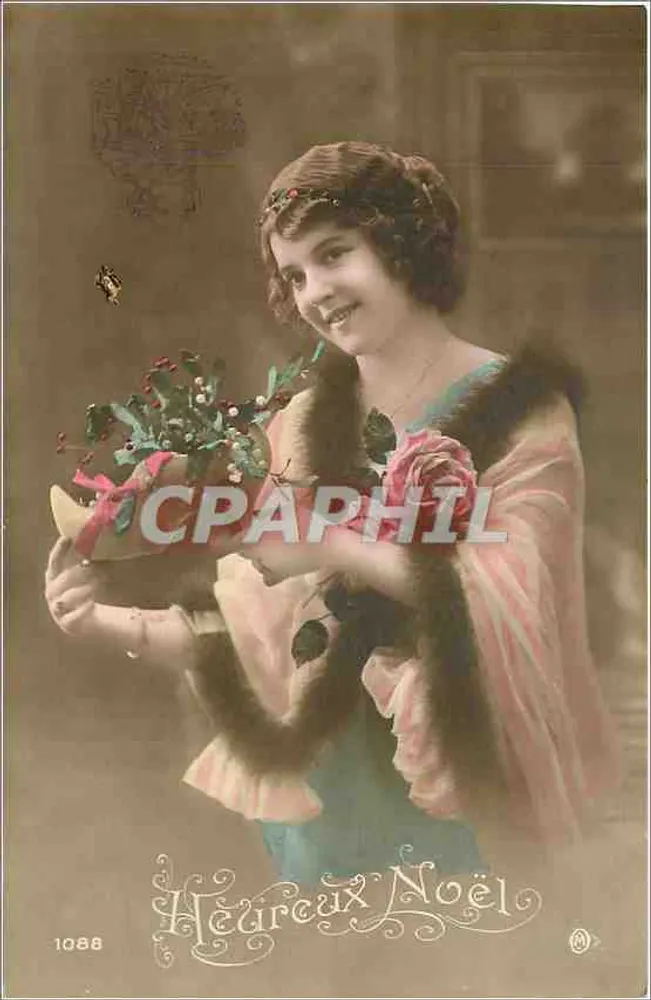 Jovem mulher segurando um pequeno abeto — texto 'Feliz Natal' — editor Delaunay, n° 1088 - Frente