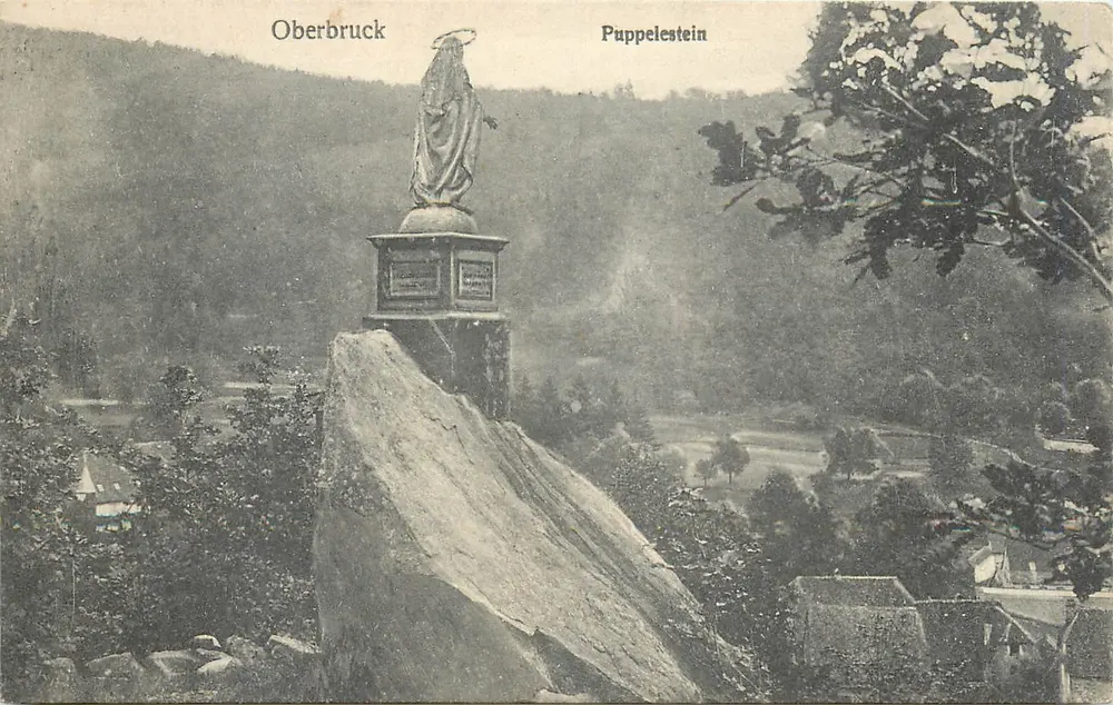 Oberbruck — Puppelestein — statue of the Virgin on rock - Front