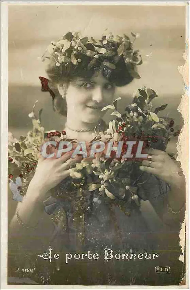 एक महिला जो एक ताज और एक हर्ब बूंद ले रही है — प्रकाशक E.L.D. संख्या 4186 - आगे