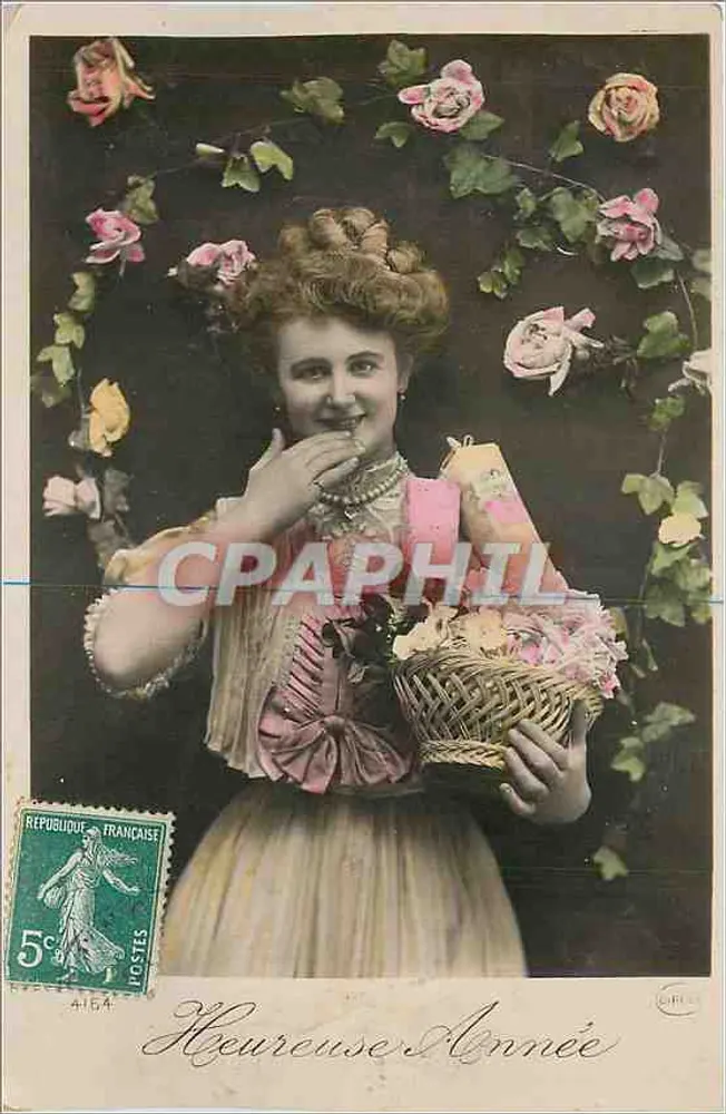 Donna sorridente che regge un cesto di fiori — 'Buon Anno' — editore ORPHEE, n° 4164 - Recto