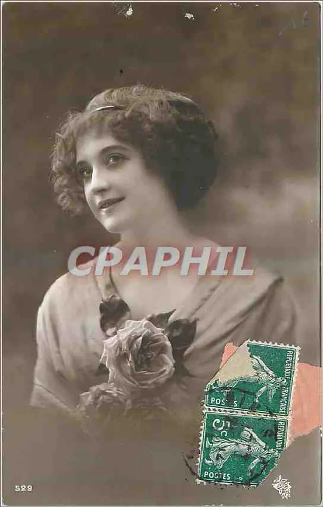 Jovem mulher com rosa — carta postal numerada 529 — editor não visível - Frente