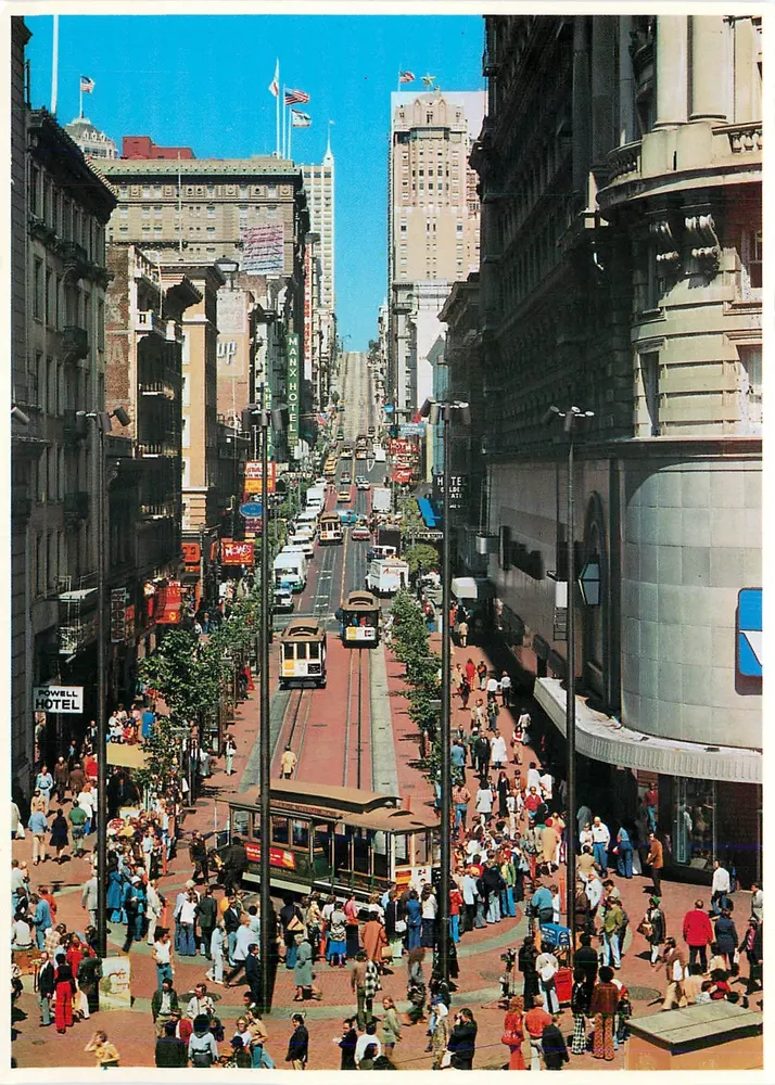 Powell e Market — moeda do « Turn Around » — Smith Novelty Co. n° E-12 - Frente