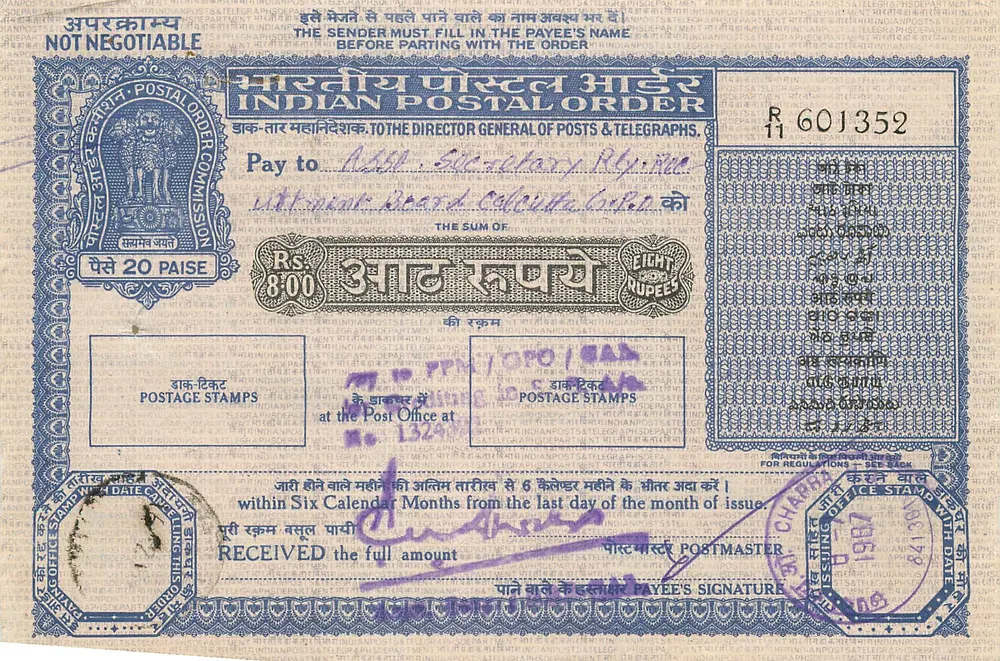 Ordem postal indiana — 8 roupias — editor: Comissão das Correios e Telégrafos Indianos, n° de série R 601352 - Frente