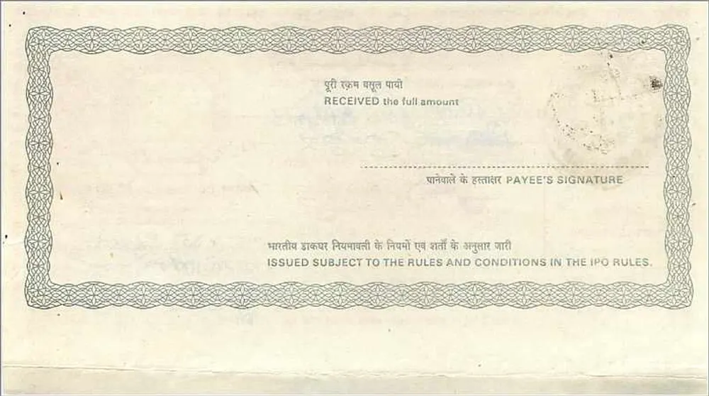 भारतीय पोस्टल आदेश — 10 रुपया — एडिटर: पोस्ट्स के डायरेक्टर जनरल - पीछे