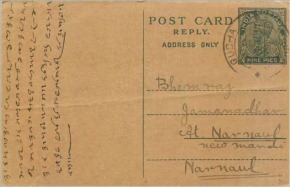 Carta postal indiana — texto em escrita local — selo 9 p. e carimbo 'Bhuj' - Frente