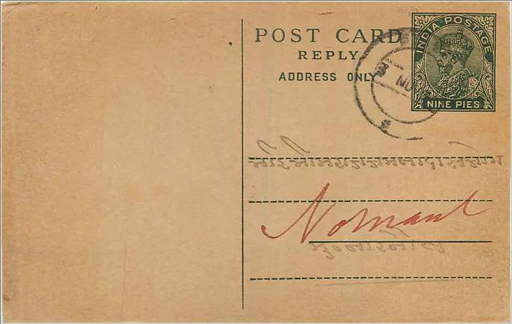 Carta postal de resposta da Índia — selo de 9 pence — escrita em escrita árabe - Frente