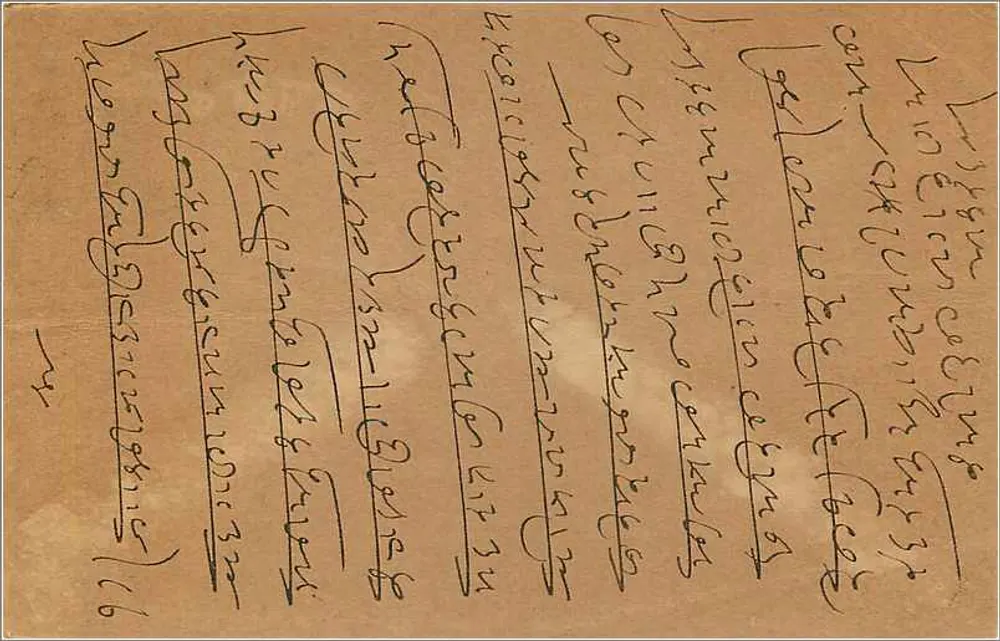 Carta postal em escrita birmanesa — Índia, selo de 9 pence — destinatário em Rangoon - Verso
