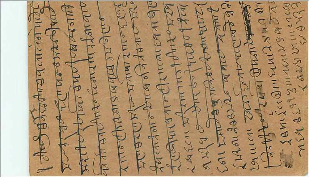 Carta postal indiana — texto em escrita devanagari — selo de 9 pence - Verso