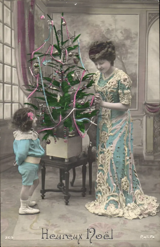 Frau und Kind vor einem Weihnachtsbaum — CaliPe, Nr. 269 - Vorderseite