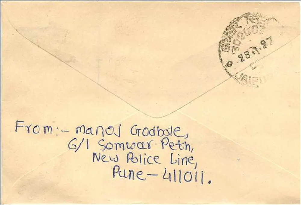 Pune - Jaipur — Envelope postal com selo de 100 INR — editor Mitttal Stamp Co. - Verso
