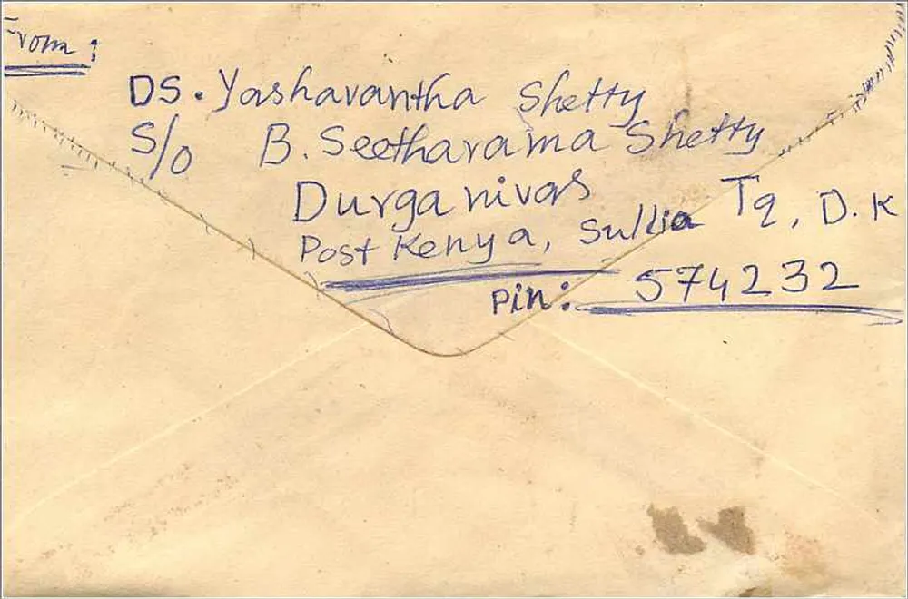 Carta postal indiana — endereçada a Jaipur — selos e cancelamento - Verso