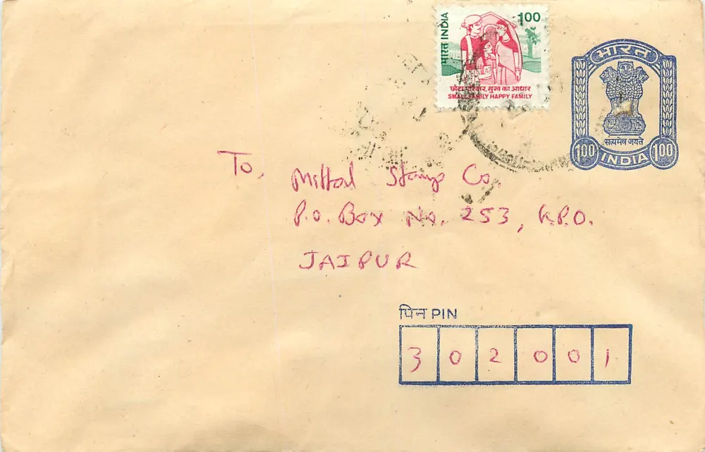 Jaipur, Indie — Poczta do Milltal Stamp Co. — znaki pocztowe i pieczątka urzędowa - Awers