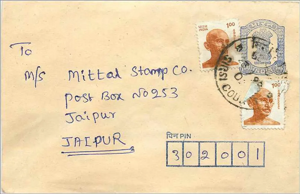 Postkarte an die Mittal Stamp Co. in Jaipur — Gandhi-Stempel und Kupferstempel 'FIRST COU' — Indien - Vorderseite