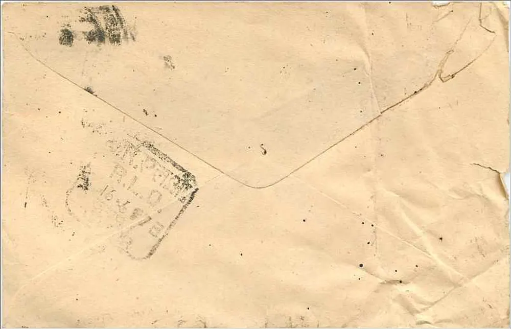 Carte postale indienne — texte en écriture devanagari — timbres et cachets de Kotchontay - Verso
