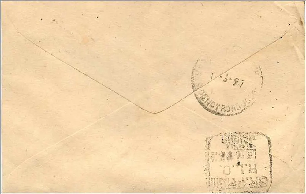 Carta postal indiana — selo de 100 p. — destinatário em Pune, Maharashtra - Verso