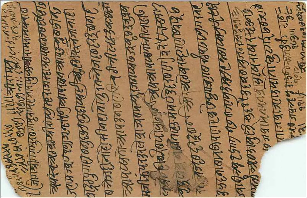 Carta postal indiana — Gwalior — texto em escrita devanagari — selo de 9 pence - Verso