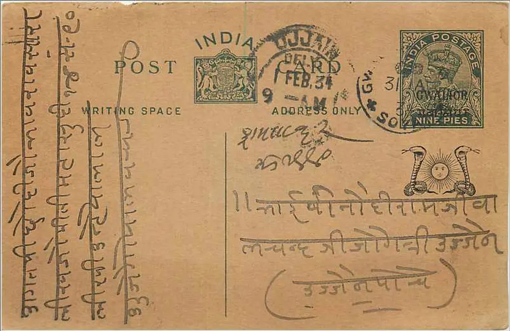 Carta postal indiana — texto em escrita devanagari — selo de 9 pence e datação de Gujarat - Frente