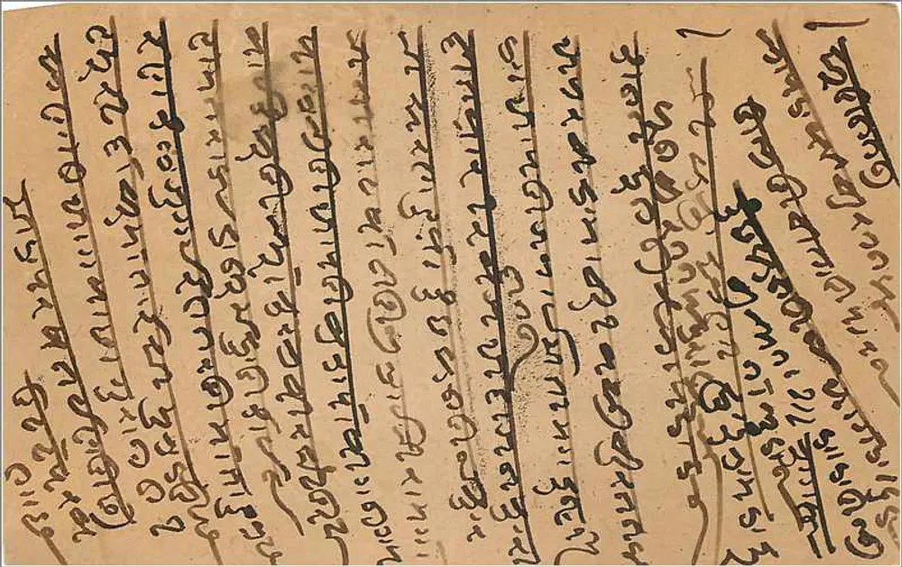 Carta postal indiana — escrita em script birmanês — selo e carimbo da Índia - Verso