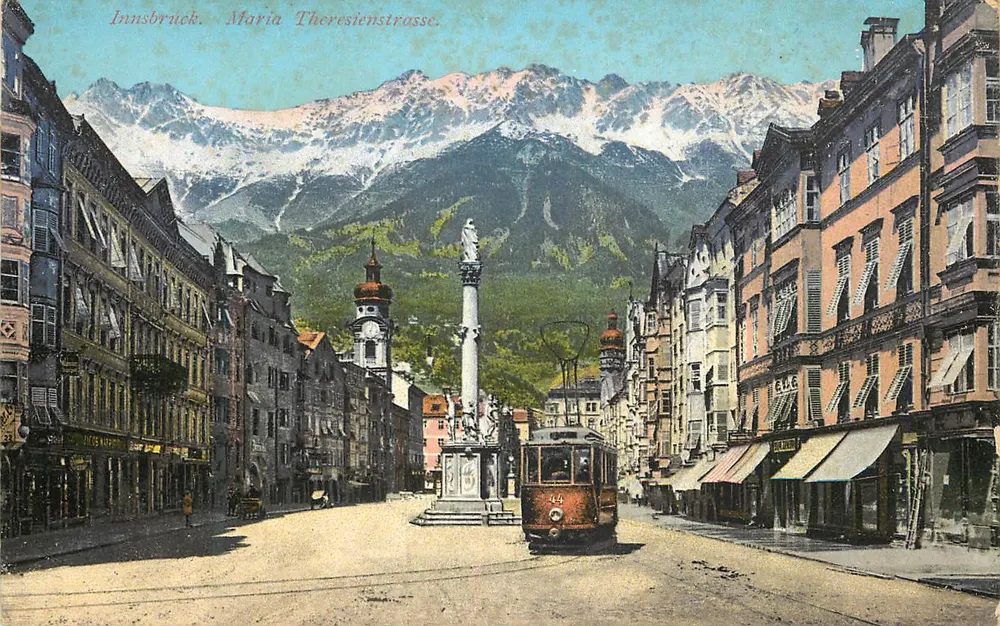 Innsbruck. Maria Theresienstrasse — widok ulicy z tramwajem i górami na tle — wydawca Robert Wäger, nr 199/199 - Awers