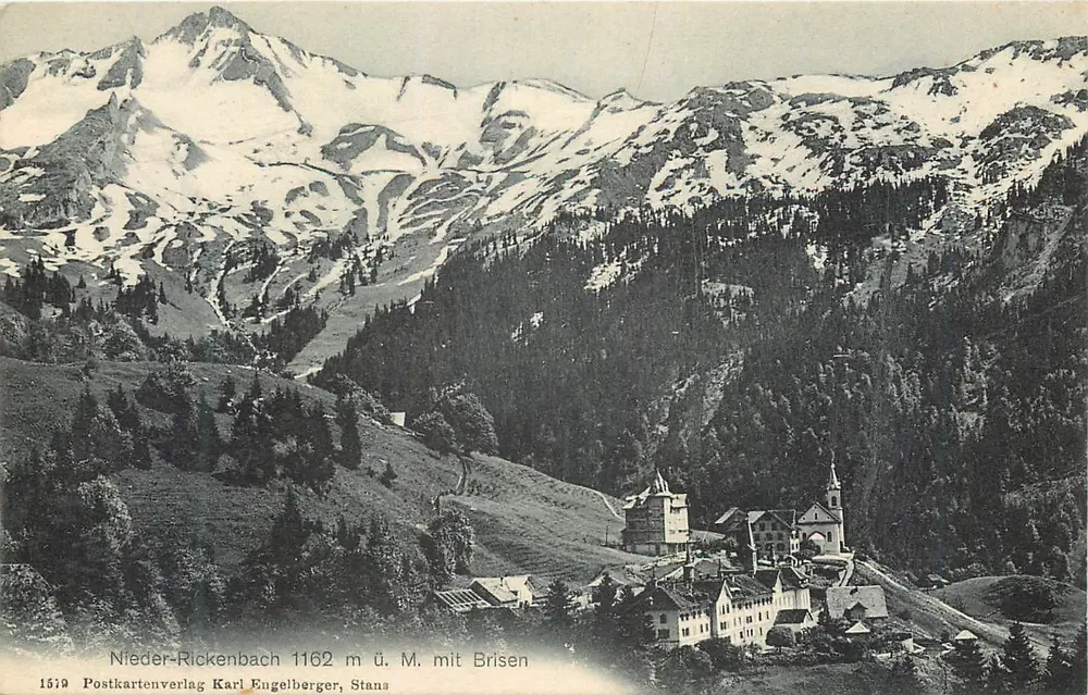 Nieder-Rickenbach — uitzicht op het dorp en de sneeuwbedekte bergen — Postkartenverlag Karl Engelberger, Stans, n° 1519 - Voorkant