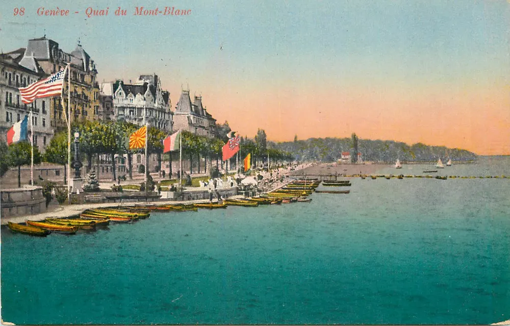 Ginevra - Quai du Mont-Blanc — vista del lago con barche e bandiere — Edizione Jäeger n°98 - Recto