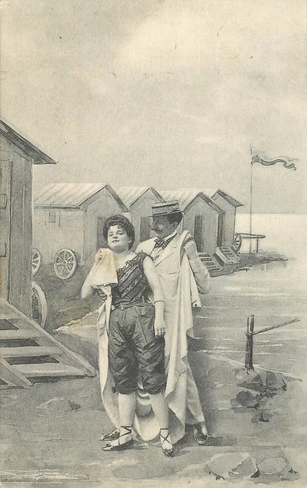 Casal na praia — cabanas de banho — editor não visível - Frente
