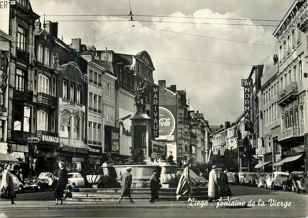 Liège - Fontaine de la Vierge — vista da rue de la Vierge com lojas e trêm - Frente