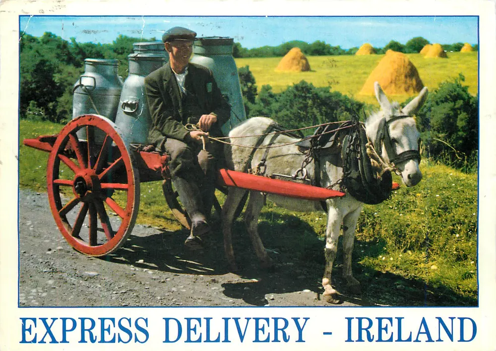 Entrega Expressa - Irlanda — homem e jumento puxando uma carruagem com baldes de leite — editor Ireland people & places - Frente