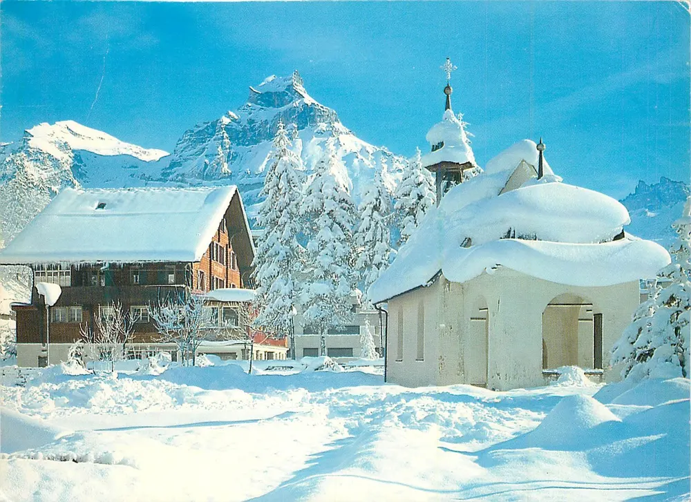 Engelberg (Zentralschweiz) — vista invernal com igreja e montanha nevada — Edição Scholl, No. 2830 - Frente