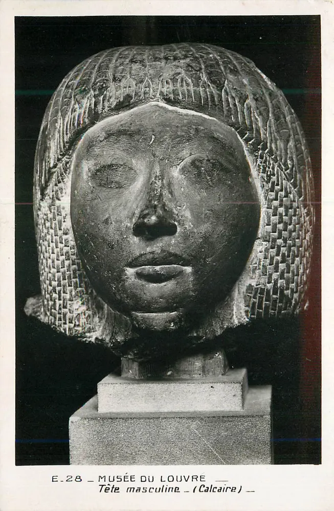 Cabeza masculina — Museo del Louvre — Caliza — E.28 - Anverso