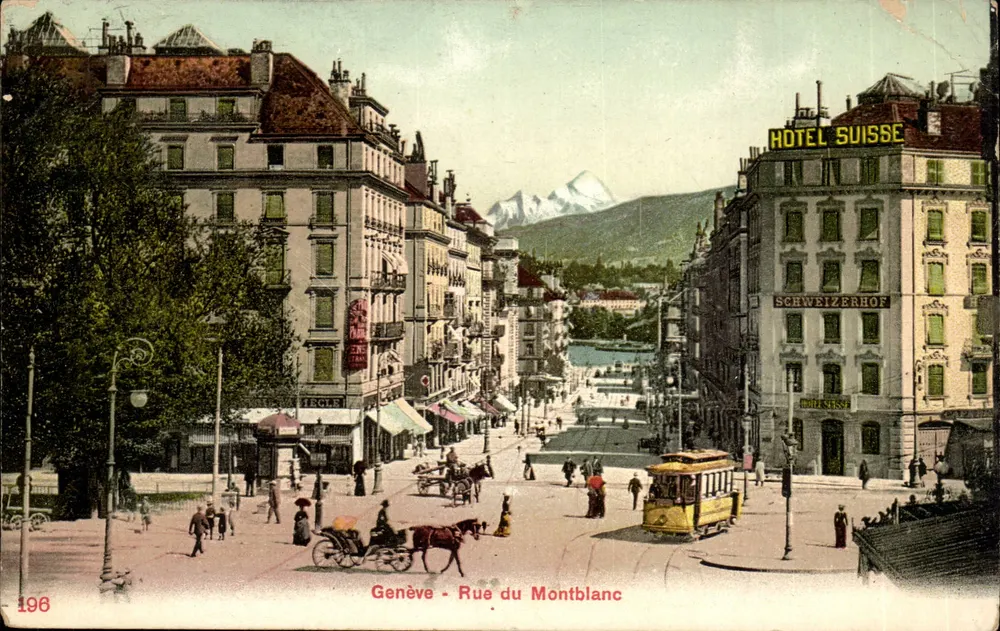 Genebra - Rue du Montblanc — vista urbana com trem e hotel Schweizerhof — editor não identificado - Frente