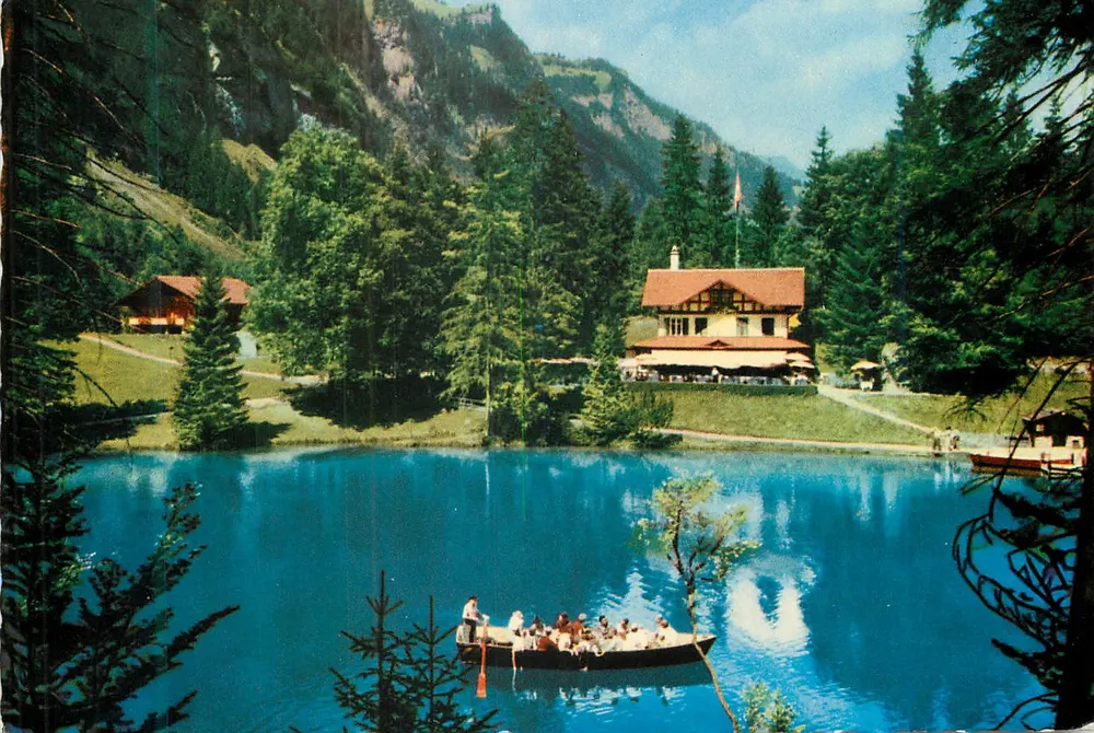 Blausee bei Kandersteg — lago alpino com cabana e barco — Verlag A. Kliener, Schwanden / GL, No. 605 - Frente
