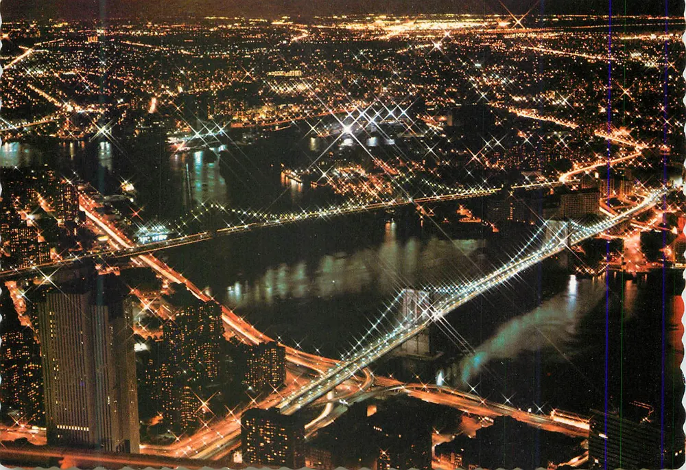 Vue nocturne de New York — pont et gratte-ciel — Manhattan Post Card Pub. Co., N.Y.C. - Recto
