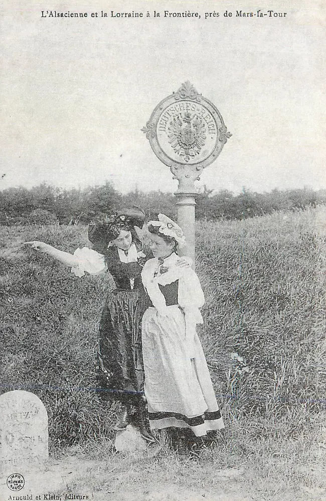 L'Alsacienne et la Lorraine à la Frontière, près de Mars-la-Tour — Aruculd et Klein, éditeurs - Recto