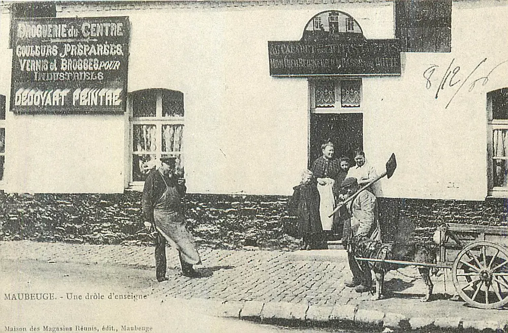 Maubeuge — Una strana insegna — Casa dei Magazzini Uniti, edito da Maubeuge - Recto