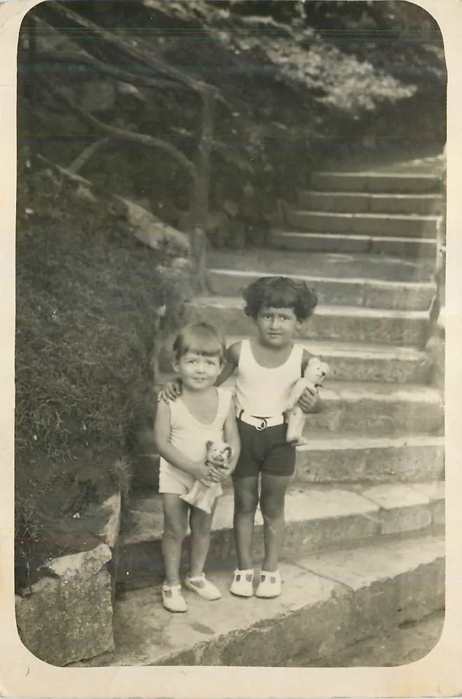 Two children on steps — publisher not visible - Front