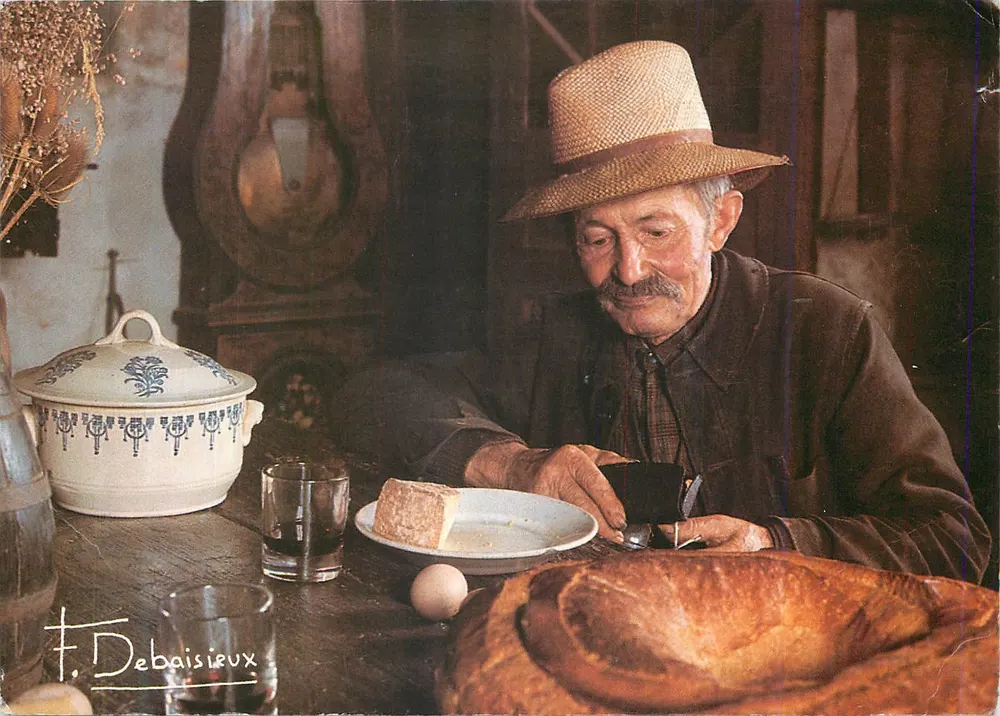 Um homem à mesa — almoço rustico — F. Debaisieux - Frente