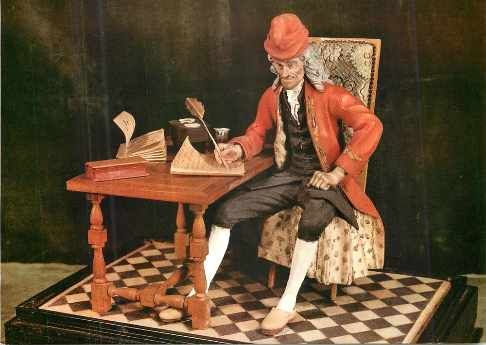 Figurina de um homem em traje de época — editor ilegível - Frente
