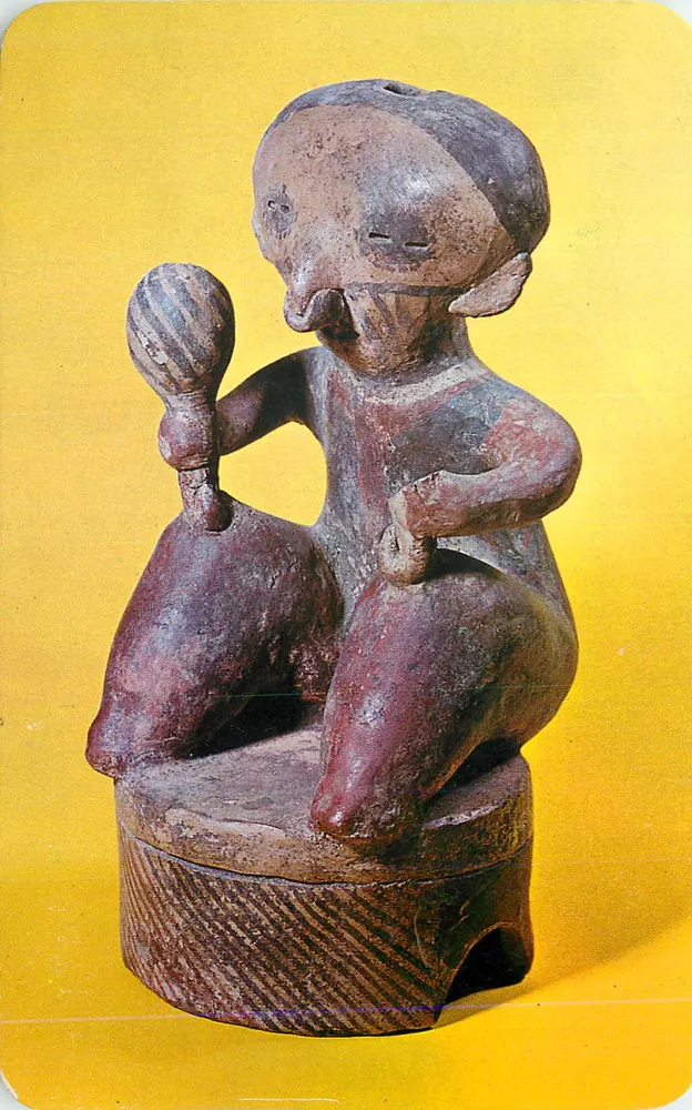 Statuette africaine assise — jouant d'un instrument — éditeur non identifié - Recto