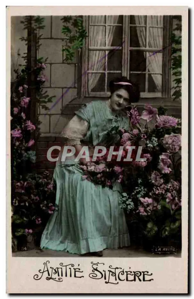 Femme en robe bleu pâle parmi les fleurs — La Reine, n° 184 - Vorderseite