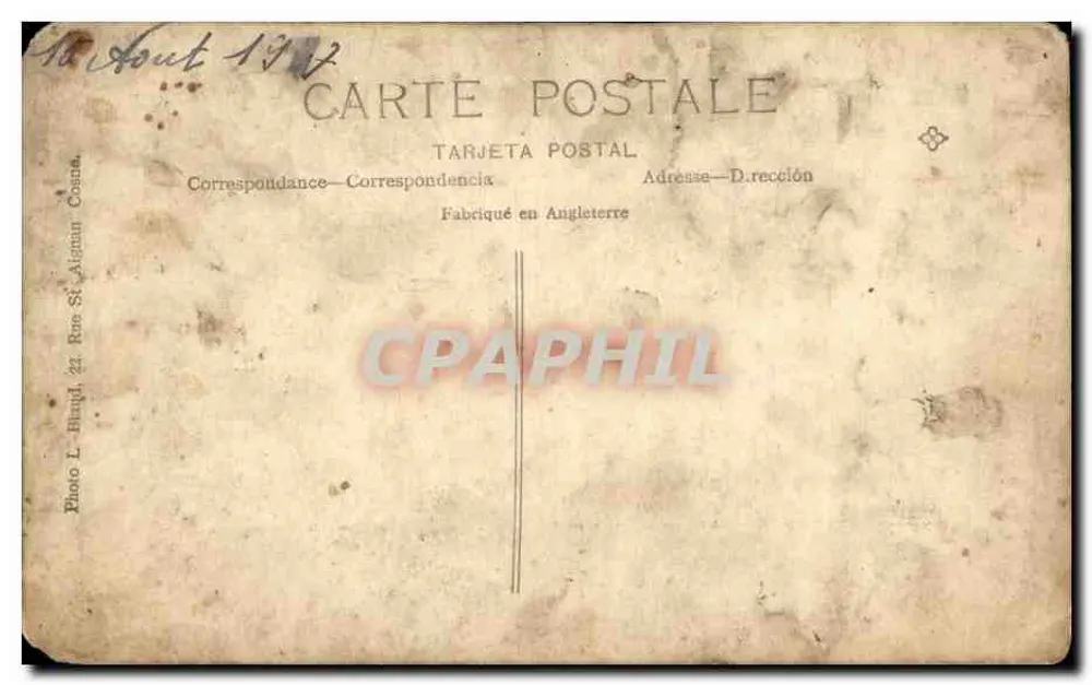 Mädchen in Karohemd und Hut — vor einem Tor — Foto L. Biniq. & Co. n°22 - Rückseite