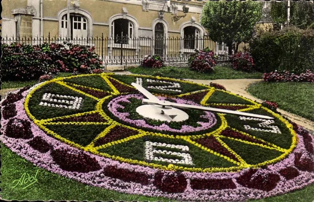 Le Mans — A Relógio Florido — Adol - Frente