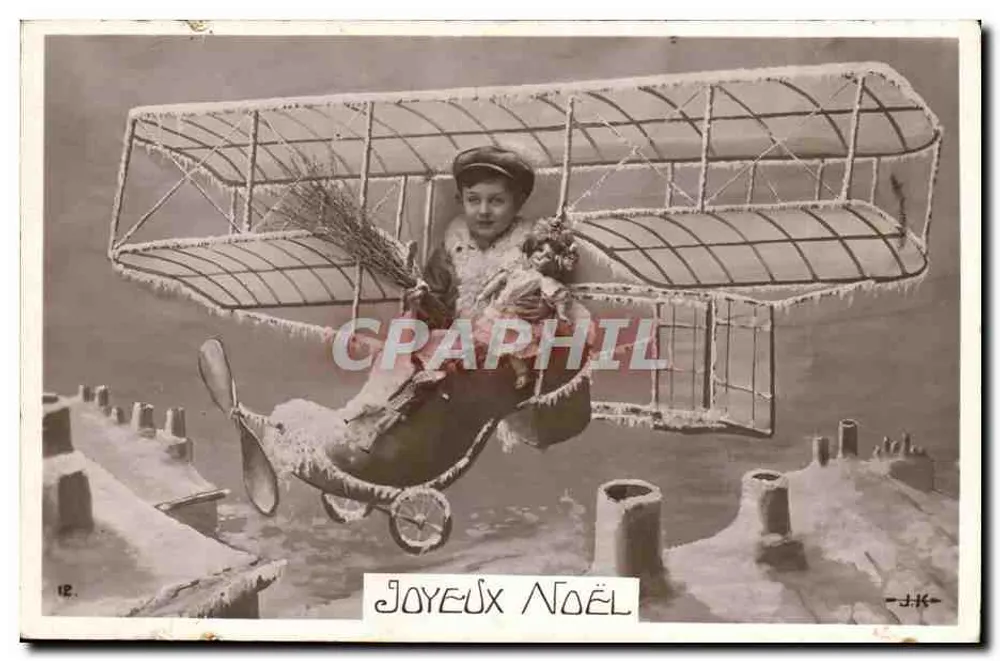 Kind in einem schneeverdeckten Flugzeug — Frohe Weihnachten — J.K. n°12 - Vorderseite