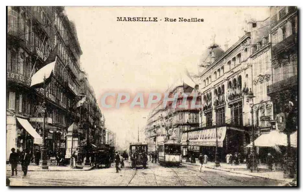 MARSEILLE - Rue Noailles — vista da rua com trêm e edifícios - Frente