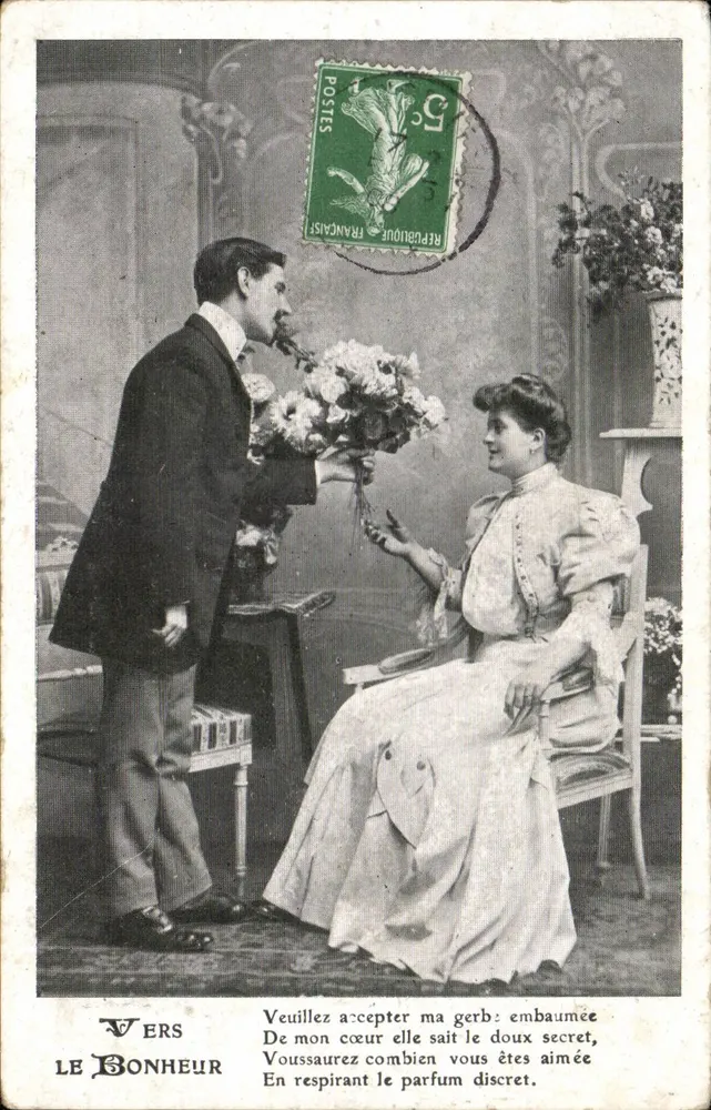 Um homem oferecendo flores a uma mulher — O Felicidade — J.C. Paris - Frente